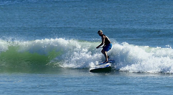 Surfing And Stand-Up Paddle Boarding At Coast Guard Beach on Cape Cod